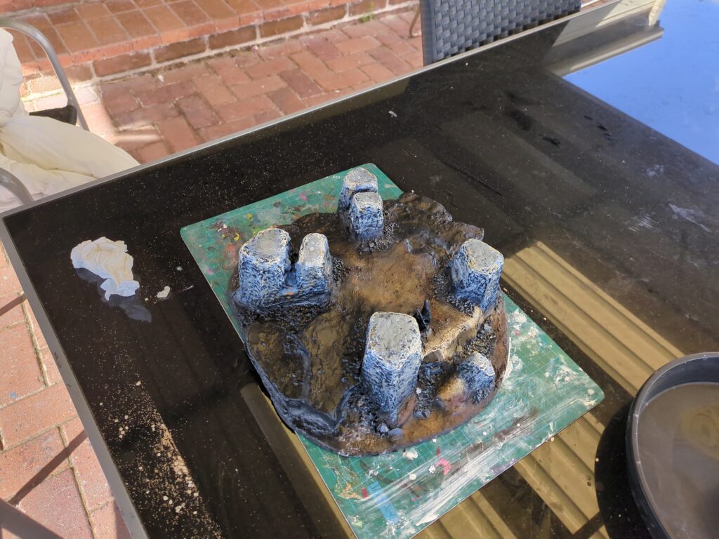 An overview showing the hills with the new plaster undercoated in black.